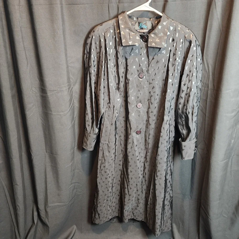 Vision brand black trench coat with a geometric triangle pattern See Photos For